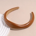 Close-up of brown faux leather headband showing fine texture and non-slip lining - Yellow Brown