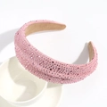 Cerchietto largo rosa con strass e perline in velluto su superficie bianca - Rosa