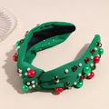 Detalle de diadema navideña de punto verde con diamantes de imitación y perlas - Verde