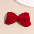 Detailed view of the velvet texture and rich red color of the elegant bow hairclip - Large Red Bow Knot