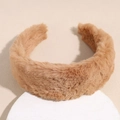 Close-up of camel thick plush headband with soft faux fur texture for women's hair styling - Tan