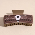 Detalle de pinza para el cabello caqui con calavera de toro y diseño geométrico boho - Cabeza de Cabra Marrón