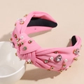 Detail of pink knotted headband with sparkling heart rhinestones and faux pearls - Bow Light Pink