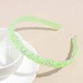 Détail d'un serre-tête vert néon avec paillettes colorées et dents antidérapantes - Vert Strass