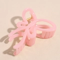 Detail of pink jelly butterfly hair claw clip with golden metal spring mechanism - Pink