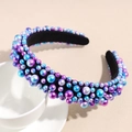 Detail of baroque padded headband with colorful assorted sized pearls on a black base - Blue and Purple