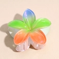 Macro shot of 5-petal acrylic flower hair claw clip with colorful gradient and pearl finish - Gradient Blue Green Orange