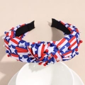 Detail of USA flag knotted headband with red, white, and blue rhinestones and pearls - Pearl Star