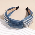Detail view of blue satin knotted headband with four rows of pearls and oval rhinestones - Navy Blue