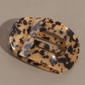 Dettaglio della pinza per capelli in acetato con motivo leopardato e tartarugato - Leopardo Giallo