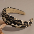 Close-up of leopard print velvet headband with thick padded design for autumn winter fashion - High Top Gray Brown