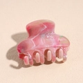 Close-up of pink marble resin hair claw clip with a soft gradient matte finish texture - 4.5cm Pink Green Solid Semicircle Claw