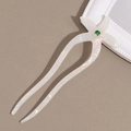 Dettaglio della forcina per capelli a U in acetato a stella marina con cristallo verde - Bianco Iridescente