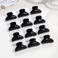 Vista dettagliata di 12 mini mollette per capelli nere a forma di corona per lo styling - Semicerchio Nero