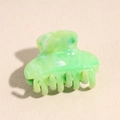Detail of light green marble texture resin hair claw clip with frosted matte finish - 4.5cm Pure Green Solid Semicircle Claw