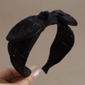 Detalle de diadema de tweed negro con lentejuelas y un lazo de satén elegante - Negro