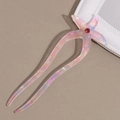 Dettaglio della forcina per capelli a stella marina rosa con strass rosso al centro - Rosa Viola