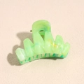 Macro shot of green marble pattern plastic hair claw clip with smooth polished finish - 4.5cm Pure Green Wavy Claw