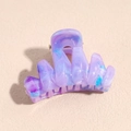 Close-up of marble pattern hair claw clip with purple and blue gradient acetate finish - 4.5cm Purple Wavy Claw