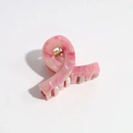 Detail of pink marble gradient hair claw clip with golden spring and twisted design - 4cm Pink Green Linear Clip