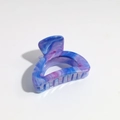 Detailed close-up of blue and purple marble texture on a gradient plastic hair claw clip - 4.5cm Purple Hollow Semicircle Claw