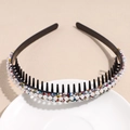 Detailed macro view of non-slip headband with colorful rhinestones and faux pearls - Colorful
