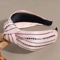 Detail of pink satin knotted headband with shiny rhinestone rows and knotted design - Pink