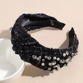 Detail of tweed headband with pearls and crystals showing rich texture and knot design - Black