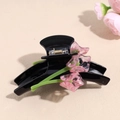 Detail of tulip hair claw clip showing 3D pink flower design and black resin finish - Black