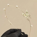 Elegant gold alloy headband with white pearls and a delicate hollow butterfly detail - Rhinestone Decor Style / Gold