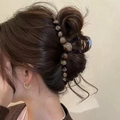 Elegant amber tortoiseshell hair claw clip with pearl beads for sophisticated hair styling - Amber Curved Style (5975232725205)