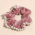 Detailed view of pink velvet scrunchie decorated with elegant white faux pearls - Rose Red