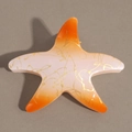 Détail de la pince à cheveux étoile de mer avec dégradé orange et texture dorée - Dégradé Orange