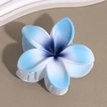 Detailed close-up of the matte blue gradient plumeria hair claw clip with sturdy white teeth - Lily Blue Navy Stamen