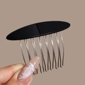 Close-up of elegant black acetic acid bow hair comb with polished metal teeth for hair styling - Small Linear Black