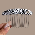 Detailed view of the acetic acid comb with silver metal teeth and France handmade mark - Linear Black White Polka Dot