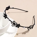 Detail of black flocked headband with pear-shaped rhinestones, pearls and floral accents - Black Flower