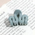 Detail of blue wavy hair claw with silver glitter finish on a stylish background - Wavy Line / Gray Blue (Splash Ink)