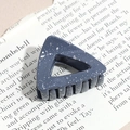 Detail of dark blue triangular hair claw clip with silver ink splatter texture on paper - Triangle / Dark Blue (Splash Ink)