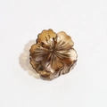 Detail view of amber resin flower hair claw clip with transparent petal texture - Brown Cherry Blossom