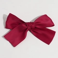 Elegant deep red satin bow hair clip with refined silky texture and classic knot design - Red