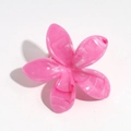 Detailed macro view of pink marble-textured acetate flower hair claw with metal spring - Rose Red