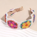 Detailed view of a bohemian style crochet headband with colorful flower patterns. - White Multicolor