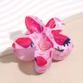 Close-up of pink flower hair claw clip with red strawberry pattern made of acrylic - Big Strawberry