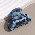Detail of blue marble acetate hair claw clip with rhinestones and anti-slip teeth - Blue