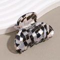 Detail of elegant acetate hair claw with rhinestone inlay and geometric textures - Grey Plaid