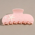 Detail der Haarklammer in Rosa mit weißen Seesternen und funkelnden kleinen Strasssteinen - Rosa