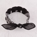 Detail of black paisley print headband with tie-knot rabbit ear design for sports - Black Headband
