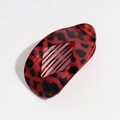 Pince à cheveux ovale plate avec motif léopard rouge et noir et design losange évidé - Imprimé Léopard Rouge Et Noir (ps)