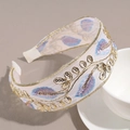 Dettaglio della fascia larga con ricami di foglie dorate e paillettes su rete bianca - Blu